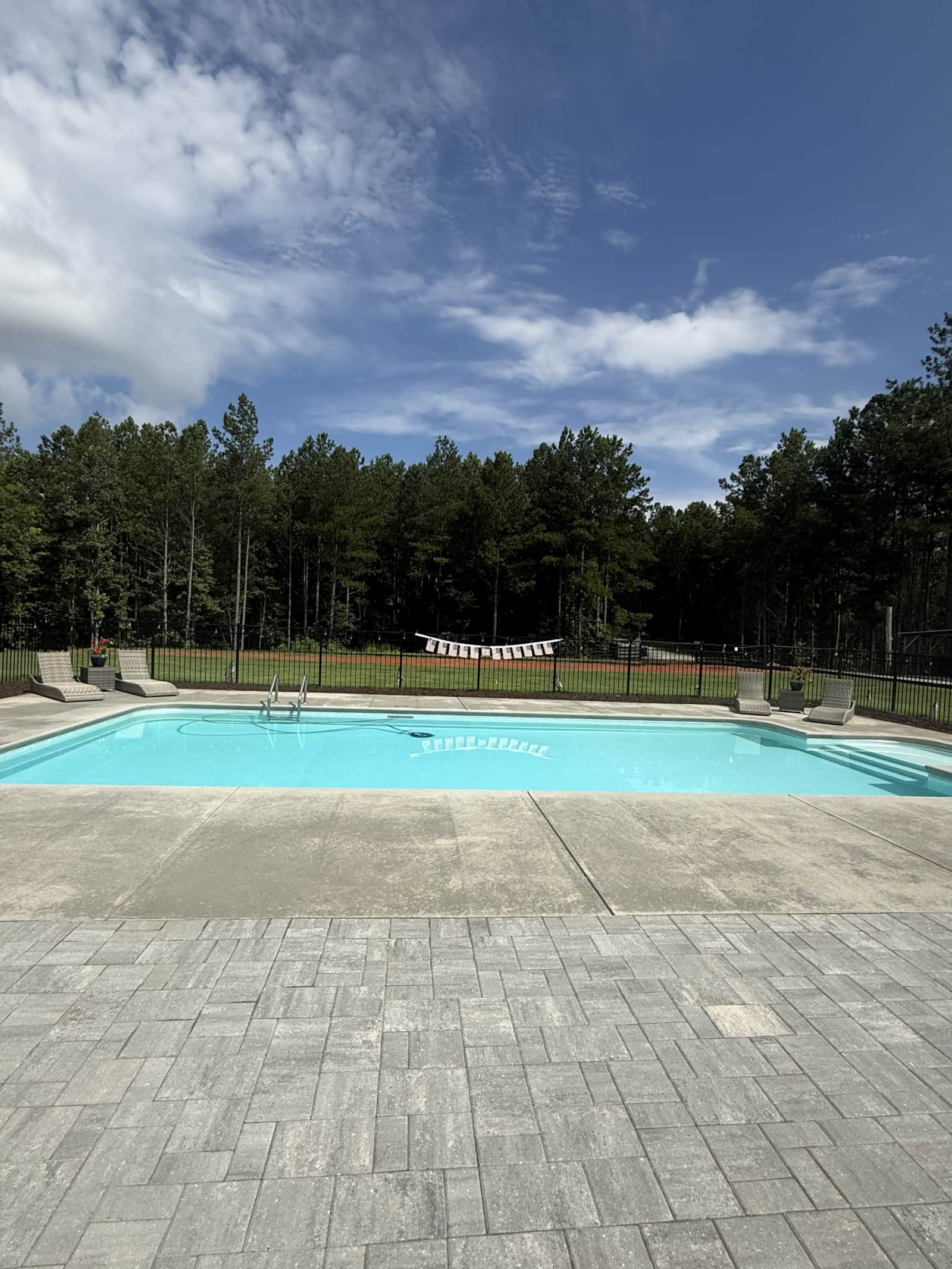 The private pool at The Sanctuary, surrounded by trees