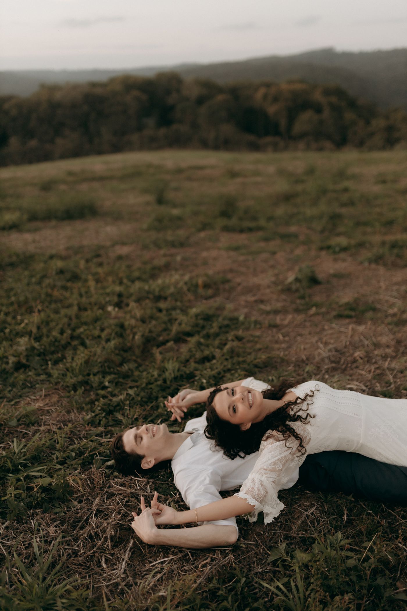 Wedding couple relaxing together outdoors