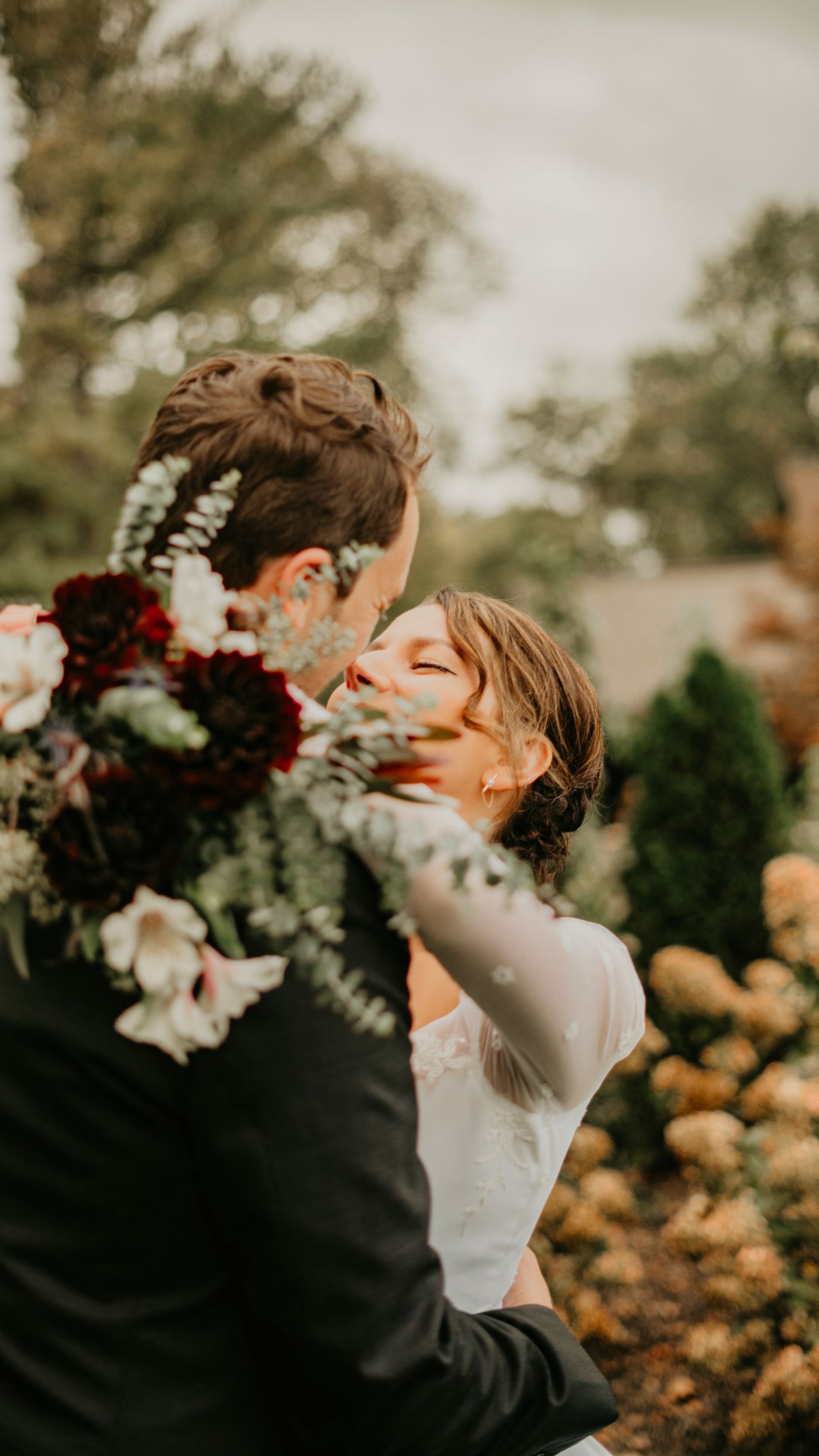 Newlywed couple sharing a kiss
